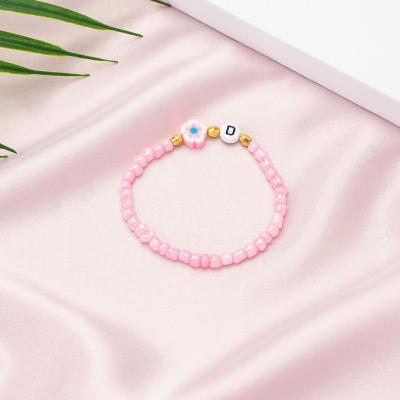 China Soft flower bracelet pink star letter bracelet cute vintage rice bead pottery children's bracelet customize for sale