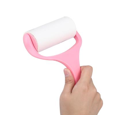 China Strong Adhesive Custom Logo Pet Hair Sticky Lint Roller Self Cleaning Fiber Brush for sale