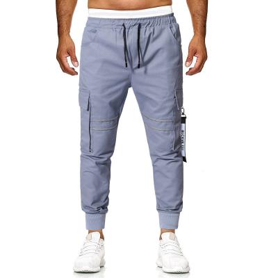 China Solid Color Drawstring Fashion Overalls Sustainable Street Pants Jogging Pants Mens Cargo Pants for sale