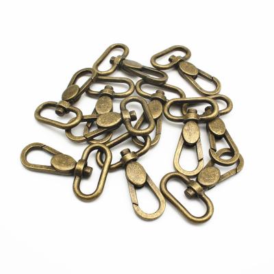 China Viable/Durable Custom Logo Zinc Alloy Antique Brass Dog Hook Snap White Spring Snap Bag Strap Hooks for sale