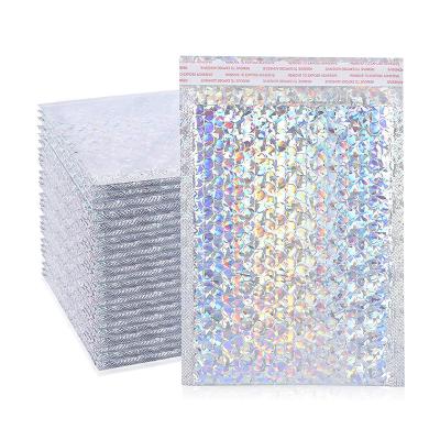 China Holographic Silver Metallic Padded Mailing Envelopes Water Proof Bubble Cushion Envelope Self Seal Mailing Bags With Logo for sale