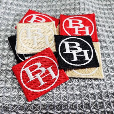 China Viable Custom Patches Embroidered Square Hat Patch Iron On Brand Logo Letter Patch for sale