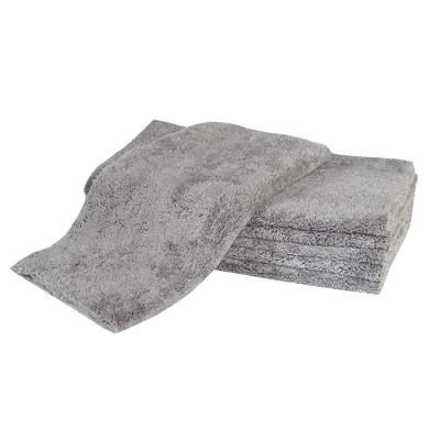 China Compressed Microfiber 500gsm Edgeless Drying Towel For Car Polish And Buffing Big Color for sale