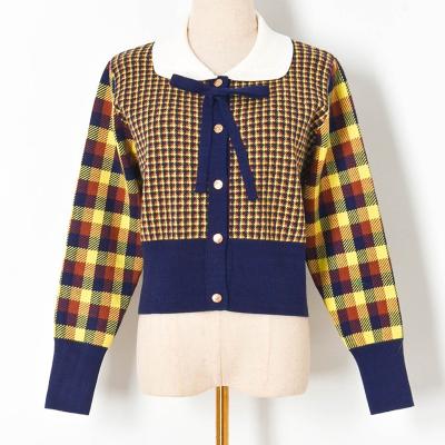 China Wholesale Women's Autumn Winter Long Sleeve Anti-Wrinkle New Colorblock Plaid Bow Soft Doll Collar Single Breasted Long Sleeve Knit Cardigan for sale