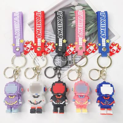 China Hot Selling Eco-friendly Customized Silicone PVC Cute Astronaut Keychain Personalized Keychain Cartoon Rubber for sale