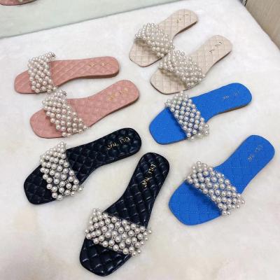 China 2021 Fashion Trend Fashion Slippers and Bags Set Fashion Solid Color Flat Shoes Ladies Bead Sandals Summer Wholesale Slippers for Women for sale