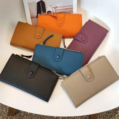 China 2021 new waterproof cowhide genuine leather ladies luxury custom long clutch wallet change card wholesale small ladies fashion wallets for sale