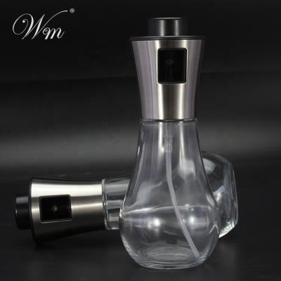 China 200ML Kitchen Tool Stainless Steel Drum Pot Olive Mist Spray Oil Stored Glass Oil Bottle For BBQ Salad for sale