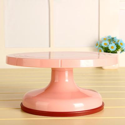 China Professional Disposable Rotating Cake Turntable Decorating Elegant Pink Stand With Non Slip Base for sale