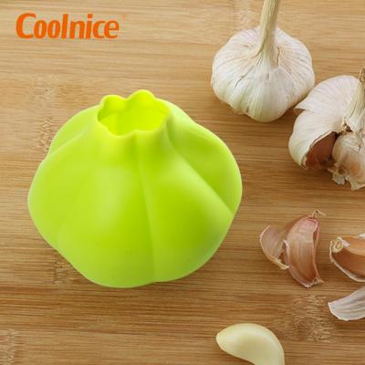 China Amazon Selling Kitchen Accessories Silicone Household Garlic Peeler Food Grade Viable Hot Manual Garlic Press for sale