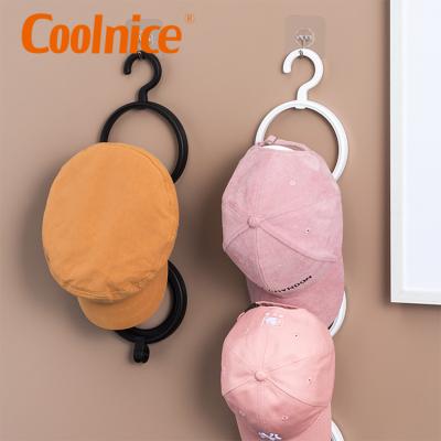 China Strong Adhesive Wall Mounted Modern Storage Rack No Punch Hook Hat Hook Scarf Hanger For Hat Hanging for sale