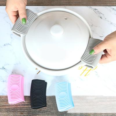 China Finger Protector Heat Resistant Cooking Pinch Grips Oven Mitt Silicone Heat Resistant Pot Holder for sale