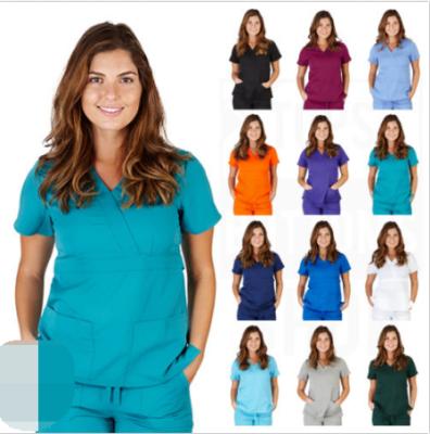 China Hospital Women Scrubs Set Six Medical Pockets Scrubs V-Neckline With Cargo Panties Uniform Hospital for sale