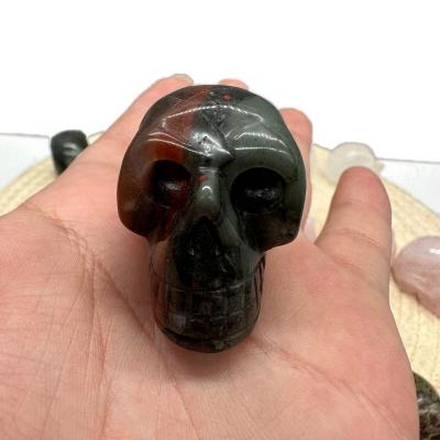 China Europe Factory Wholesale 1.5 inches Natural African Blood Stone Healing Crystal Skulls Christmas Decoration for sale