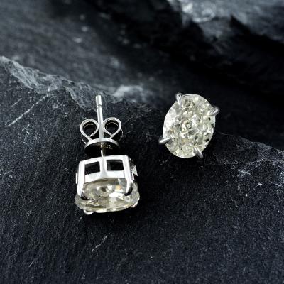 China Other Stud Earrings Sea Ice Blue Flower Cut 79 Diamond Claw Set 925 Oval High Carbon Tremella for sale