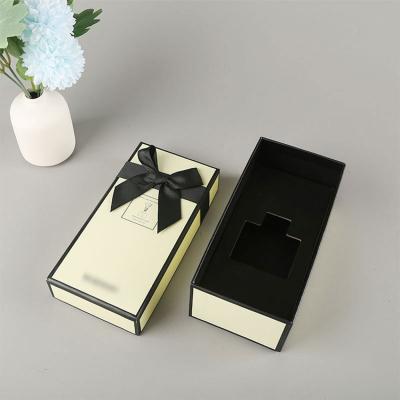 China Recycled materials hot sale fashion logo cardboard packaging custom perfume box with lid and base for sale