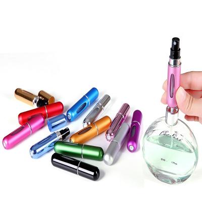 China Mini Bottom 5ml Portable Refillable Spray Pump Refillable Bottle Cosmetic Plastic Perfume Pen Bottle for sale