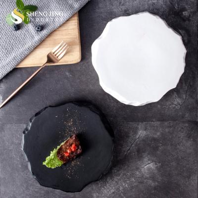 China Durable Modern Stone Matte Black Platter Asymmetric Porcelain Shape Dish for sale