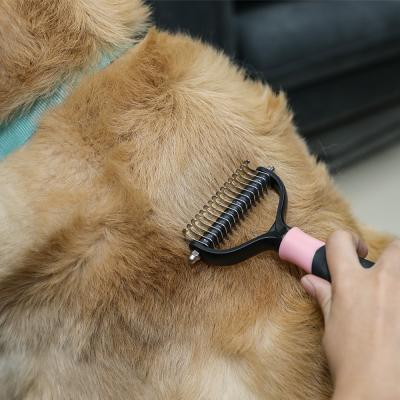 China Safe Pet Grooming Brush Dog Cleaning Comb Safe Easy Shedding Dematting Brush for sale