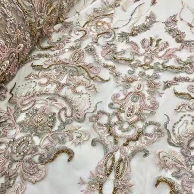 China Viable Lace Fabric For Wedding Dresses Embroidered Net Sequins Beaded Tulle Lace Up Fabric Embroidery For Evening Dress for sale