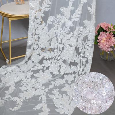 China Viable good quality MX757 2021 beaded bridal lace fabric flowers embroidery fabric textile lace for wedding dress for sale