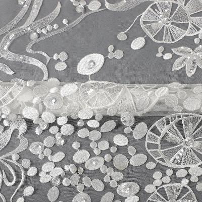 China MX551 2021 viable new design white sequins lace fabric african sequins trim lace fabric with wedding dress for sale