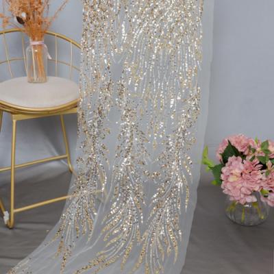 China GY4051 Bridal High Quality Sustainable Embroidery Lace Fabric White Beaded Material Sequin Mesh Fabric for sale