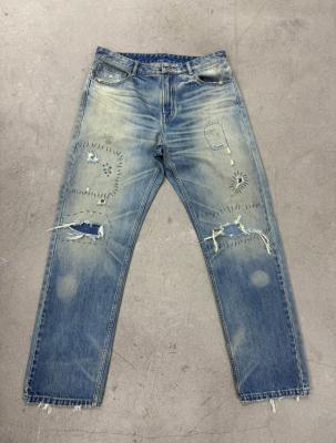 China Light Wash Denim Bottom With Heavy Distressing For A Rugged Vintage Look for sale