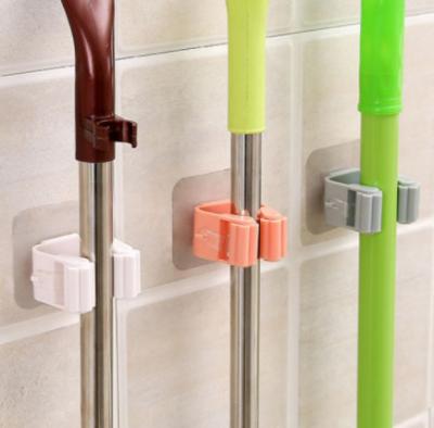 China Wall Mounted Organizer Self-adhesive Storage Holders Self-adhesive Holders Bathroom Broom Mop Holder Mop Hanger Tool Rack for Vegetable Garden for sale