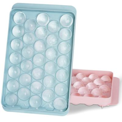 China Sustainable DUMO Round Ice Cube Tray With Lid Mold Maker Freezer Making Mini Circle Sphere Ice Cube Tray for sale