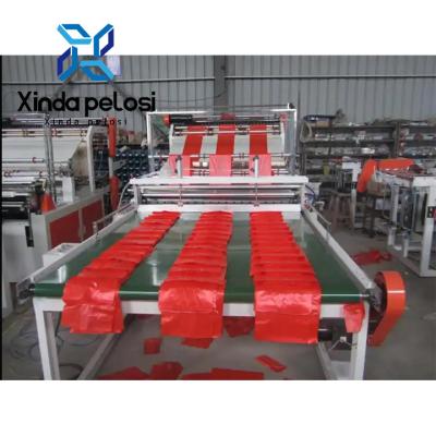 Cina Macchina automatica per la fabbricazione di sacchetti da trasporto 220V Macchina per il taglio di sacchetti di plastica con trasportatore a nastro automatico in vendita