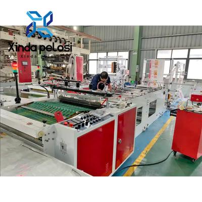 China 150-700MM Cross Handle Diaper Bag Making Machine Soft Loop Handle Bag Making Machine for sale