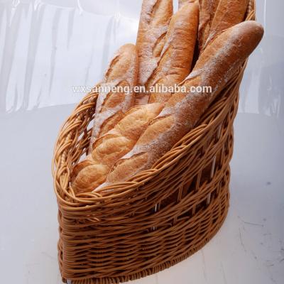 China Food Standard Sustainable Washable Handmade Boat Shaped Plastic Wicker Bread Basket for sale