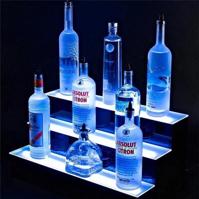 China Customized 3 Tier Bar Led Acrylic Wine Bottle Liquor Shelf Vodka Display Rack Wine Bottle Display Rack for sale