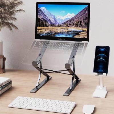 China 2022 Portable/Foldable/Adjustable Invisible Aluminum Stand Vesa Support Notebook Desktop Cooling For Mac Apple Laptop Stand for sale