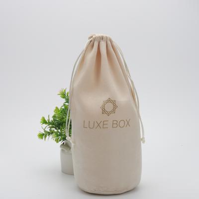 China Recyclable Wholesale Round Suede Drawstring Bottom Rice Bag Soft Suede Packaging Dust Bag for sale