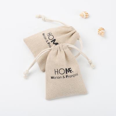 China Eco-friendly Recyclable Small Jute Drawstring Pouch Burlap Gift Bag For Candle for sale