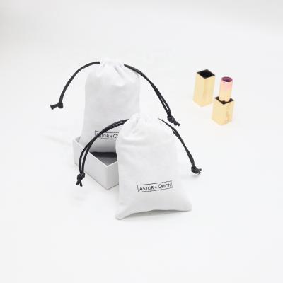 China Recyclable Custom Small White Cotton Pouch For Key Loop Cut Out Cotton Muslin Drawstring Packaging High Quality Dust Bag for sale