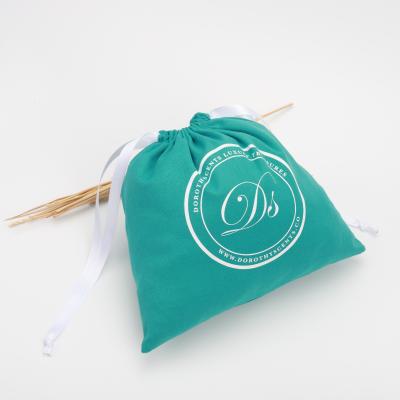 China Recyclable Wholesale Blue Canvas Drawstring Dust Bag Cosmetic Packaging Bag for sale