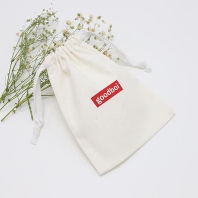 China Custom Drawstring Logo Printed Brush Cotton Canvas Safety Cosmetic Skin Care Bags Canvas Gift Jewelry Packaging Pouch for sale