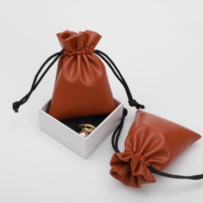 China Recyclable Custom Logo Printed Pu Leather Makeup Small Drawstring Bag Gift Pouch for sale