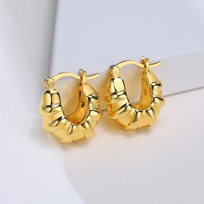 China New Cute Crescent Cute Bread Shape Temperament Hollow Earrings for sale