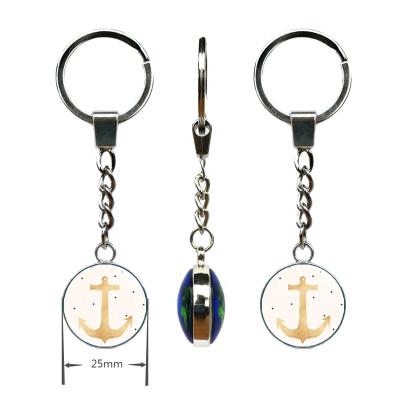 China Round Promotion Gift 25mm Custom Double Sided Crystal Pattern Glass Metal Anchor Key Chain for sale