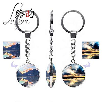 China Jordan Key Chain Innovative Products Mask Keychain Double Side Custom Peacock Crystal Glass Alloy Keychain for sale