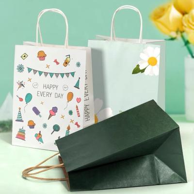 China Handmade Wholesale Customized Paper Lunch Flower Bags Shopping Paper Bag With Handle Custom Logo For Cafe Apparel for sale