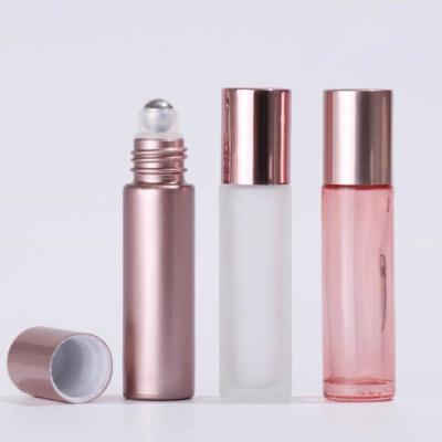 China Luxury Cosmetic Rose Opal Glass Roller Perfume Bottle Rose Gold Essential Oil Roll On Bottle 5ml 10ml Packaging for sale