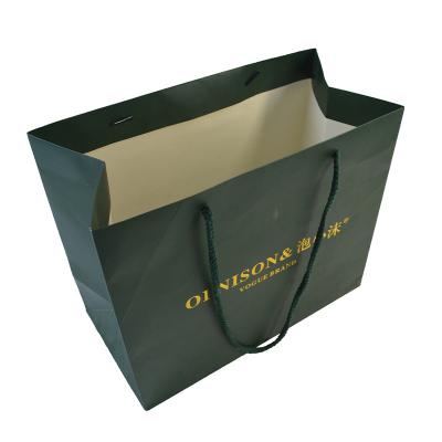 China Free Sample Recyclable In Stock Matte Recycled Apparel Paper Bag Waterproof Biodegradable for sale