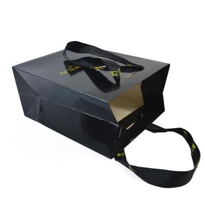 China OEM Recyclable Gift Black Shoulder Length Handle Portable Small Paper Bags Drawstring Handle Rope for sale