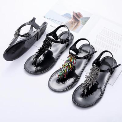 China Flat Clear Fruit Beach Shoes Non Slip PVC Tassel Sandals For Women for sale