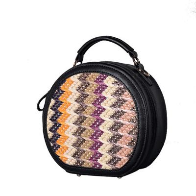 China Niyang Fashion Colorful Straw Material Shoulder Bag Fashion Girls Summer Girls Beach Travel Black Round PP Straw Bag Women Factory for sale